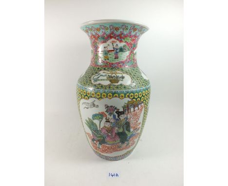 A mid 20th century Chinese vase painted dignitaries and oriental motifs on a scale ground, 37cm tall