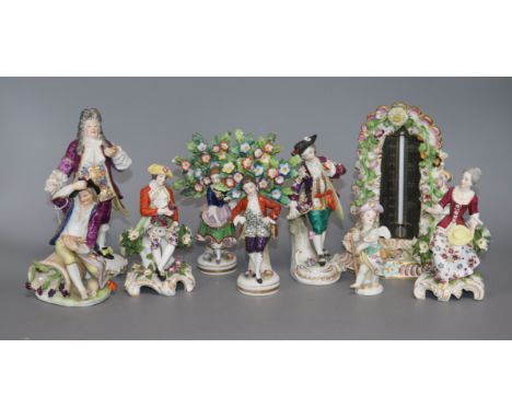 Eight porcelain figures and a floral encrusted thermometer
