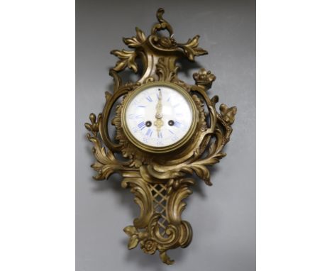 A gilt metal Cartel clock Height 51cm