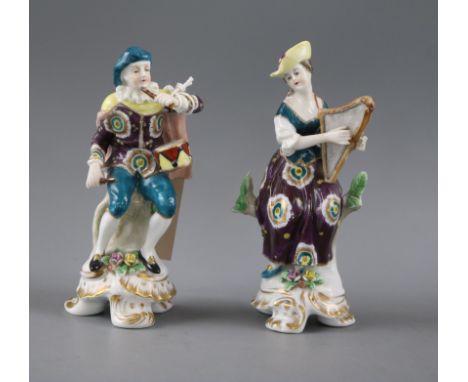 A pair of Samson porcelain figures of musicians, he playing the fife and drum, she the harp, pseudo Chelsea Anchor marks, 14c