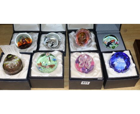 Eight paperweights including Caithness