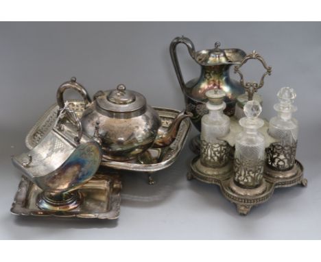 A quantity of plated silver including a teapot, mini coal scuttle etc