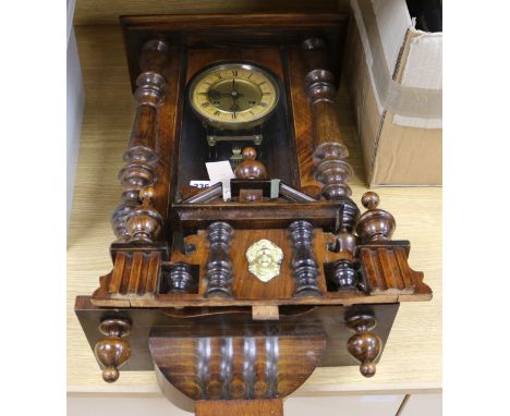 A mahogany wall clock