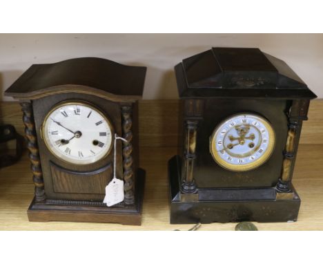 A French slate and enamel mantel clock by S Marti &amp; cie Medaille and a German oak mantel clock