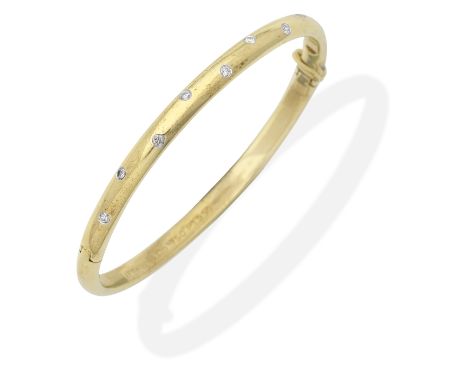 TIFFANY: DIAMOND-SET BANGLEHinged, set with brilliant-cut diamonds, signed Tiffany &amp; Co., inner circumference approx. 16.