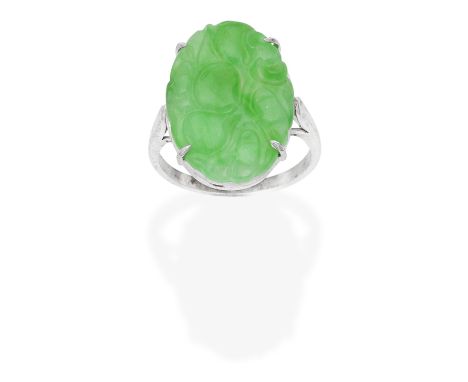 JADE RINGCarved Jadeite Jade plaque, ring size approx. K½Footnotes:GCS: Natural Jadeite, no indications of impregnation, repo