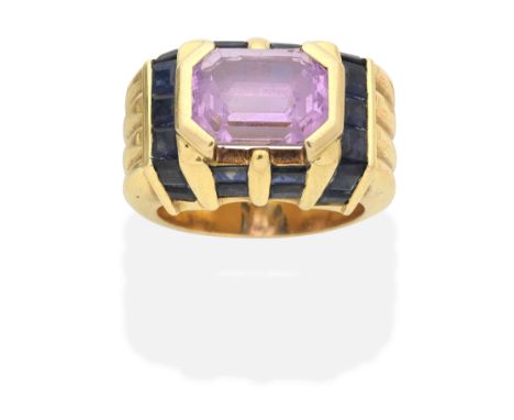 PINK SAPPHIRE AND SAPPHIRE DRESS RINGStep-cut pink sapphire, square and baguette-cut sapphires, pink sapphire approx. 4.30cts