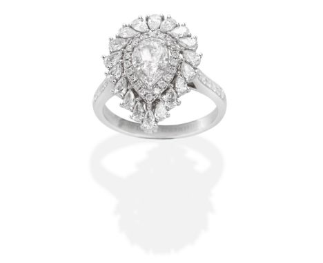 DIAMOND CLUSTER RING/PENDANTPear-shaped diamond, weighing 1.02 carats, within a pear-shaped and brilliant-cut diamond surroun