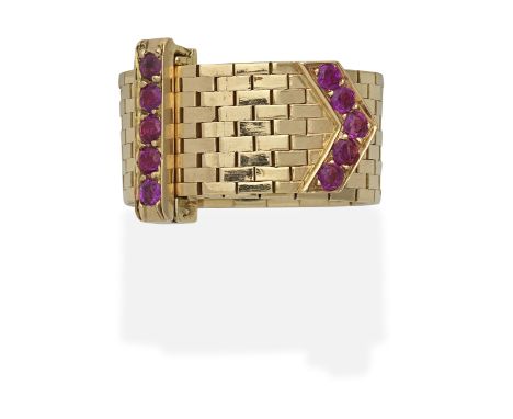 CARTIER: RUBY-SET BUCKLE RING, CIRCA 1950Circular-cut rubies, signed Cartier, numbered, adjustableFor further information on 