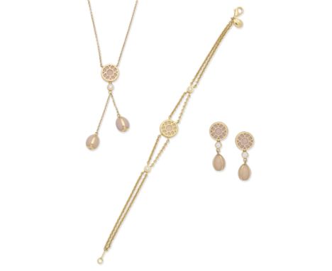 FABERGÉ: ENAMEL NECKLACE, EARRINGS AND BRACELET SUITEEach decorated with pink enamel and brilliant-cut diamonds, mounted in 1
