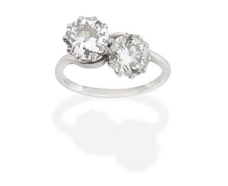 DIAMOND TWO-STONE RINGSet with old brilliant-cut diamonds,  diamonds approx. 2.60cts total,  ring size approx. KFor further i