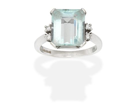 AQUAMARINE AND DIAMOND RING,  1994Step-cut aquamarine and brilliant-cut diamonds, mounted in 9 carat white gold,  ring size a