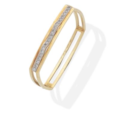 DIAMOND BANGLE, 1978Brilliant-cut diamonds, mounted in 18 carat gold, diamonds approx. 1.05cts total, UK hallmark, inner circ