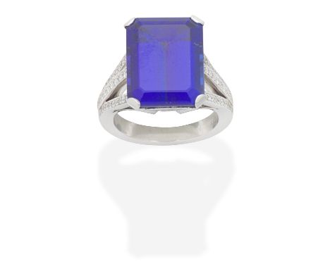 BOODLES: TANZANITE AND DIAMOND RING, 2004Step-cut tanzanite and brilliant-cut diamond shoulders, mounted in platinum, tanzani