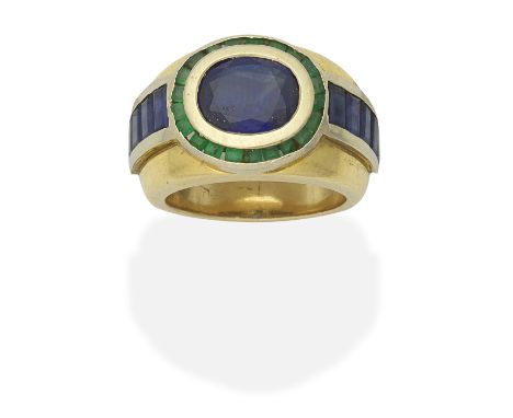 SAPPHIRE AND EMERALD RINGOval and baguette-cut sapphires, square-cut emeralds, principal sapphire approx. 1.85cts, ring size 