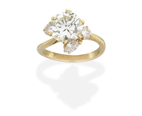 DIAMOND RINGThe brilliant-cut diamond weighing 2.51 carats, within a marquise and similarly-cut diamond surround, remaining d