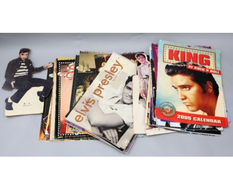 Large collection of Elvis Presley vintage calendars & standees