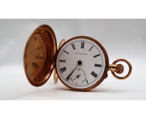 A 14K yellow metal keyless wound full hunter pocket watch, the white enamel dial with Roman numerals and a seconds subsidiary