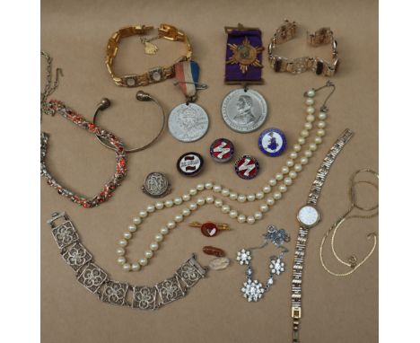 Assorted costume jewellery including faux pearls, commemorative medals, enamel pin badges, bracelets, watch etc