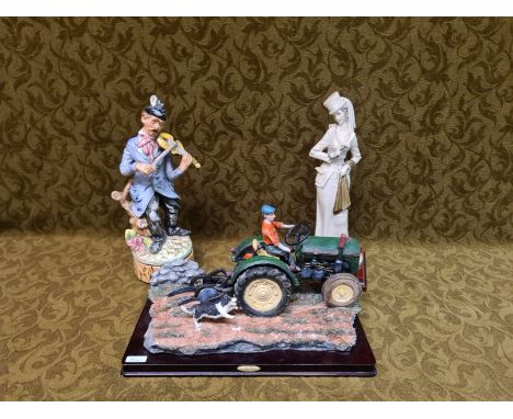 Modern decorative figurines, Juliana Collection "Tractor Driver", musical Violin playing Tramp and a B. Merli figure of a lad