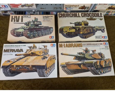 4 x Tamiya 1/35 scale WWII military model vehicles.  Churchill crocodile Flame Thrower Tank, M-1 Abrams Main Battle Tank, RV-