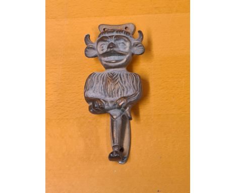 Brass Lincoln Imp door knocker, standing 15cm tall.