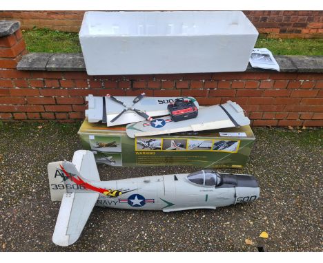 Starmax A1 Skyraider model plane with original box and handbook, assumed to be complete but not guaranteed.