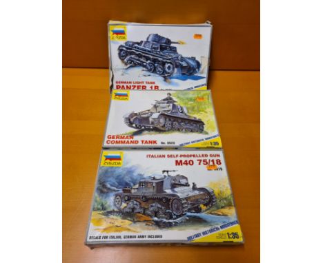 3 x Zvezda 1/35 scale WWII military models.  German Command Tank N. 3523, Italian Self Propelled Gun M40 75/18 and German Lig