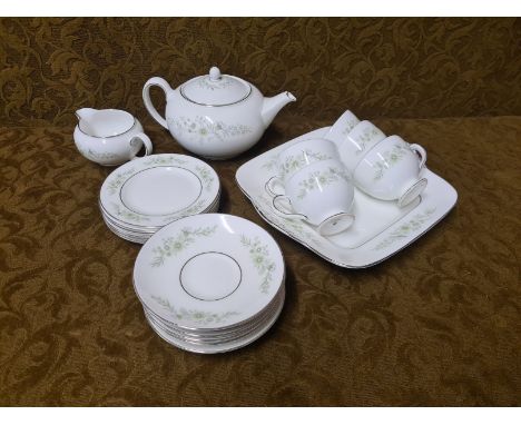 Wedgwood Westbury pattern teaset comprising teapot, milk jug, cake plate, 6 tea plates and saucers and 5 teacups.