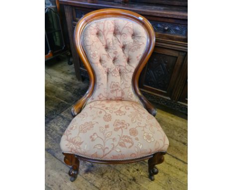 Victorian mahogany button back chair upon cabriole legs, recently upholstered in a peach William Morris type fabric.