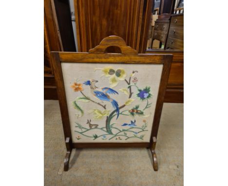 Mahogany framed fire screen with exotic bird tapestry.