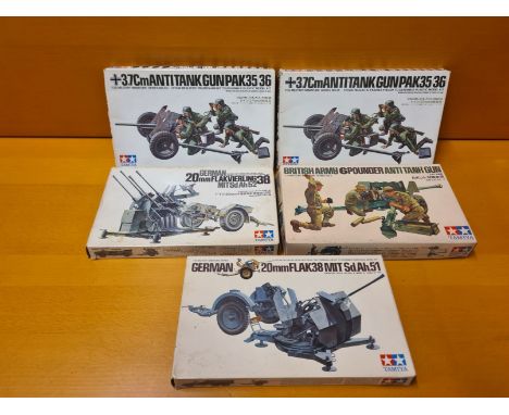 5 x Tamiya 1/35 scale WWII military guns.  2 x German 3.7cm Anti Tank Gun, German 20mm Flakvierling, British Army 6 Pounder A