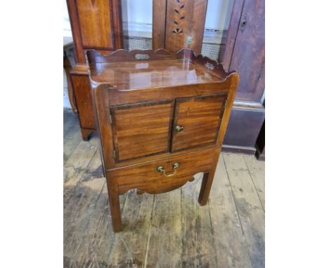 Georgian mahogany gallery top commode with two crossbanded drawers, single commode drawer, brass handle and shaped apron.  Ci