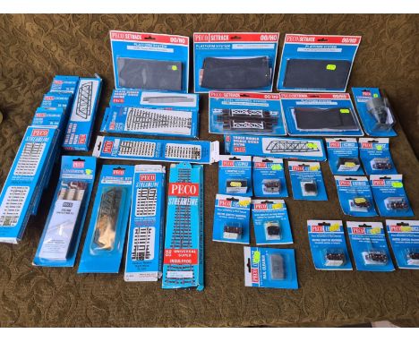 A quantity of Peco 00 gauge model railway accessories.