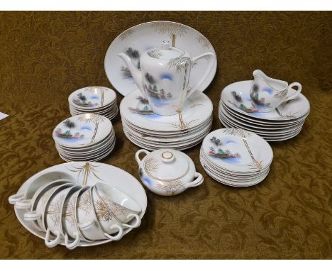 A large Japanese Kutani dinner and tea service comprising 8 dinner plates, 8 soup dishes, 8 dessert dishes, 8 side plates, 8 