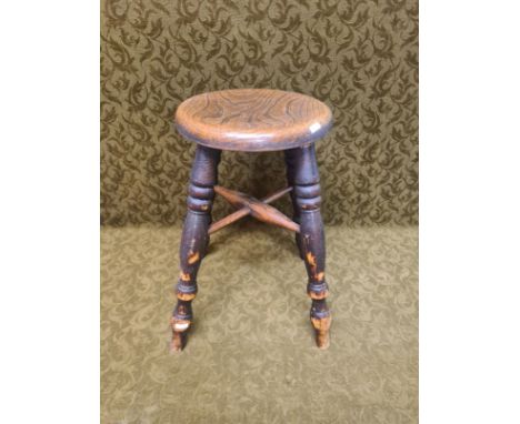 Early 20th century button top stool.