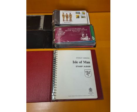 3 albums Isle of Man stamps and First Day Covers.