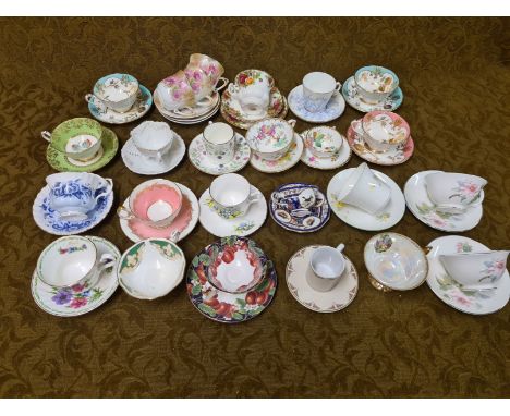 Large quantity of decorative porcelain teacups and saucers, various makers to include Aynsley, Royal Albert, Royal Grafton, T