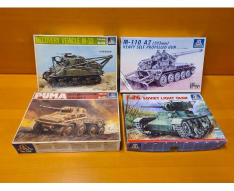 4 x Italeri 1/35 scale WWII tanks and military models. Puma Heavy Duty Armoured Car, M-32 Recovery Vehicle, T-26 Soviet Light
