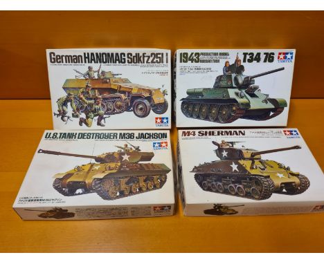 4 x Tamiya 1/35 scale WWII military vehicles. Handoman German Tank, T34/76 1943 Production Model Tank, US M36 Jackson Tank an