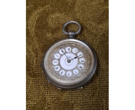 Ladies 800 silver pocket watch with silver gilt enamel Roman numeral dial and working movement.
