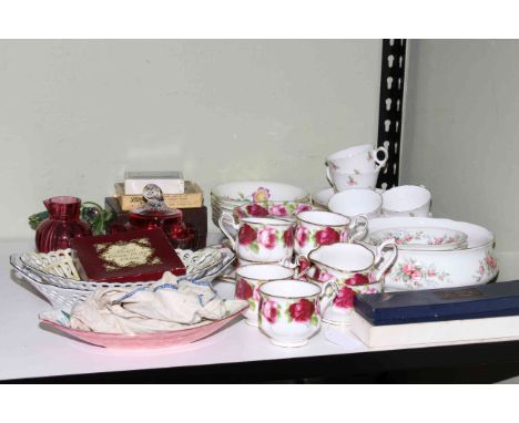 Shelf of military cap badges, Royal Albert, Royal Stafford, Maling, ruby glass.