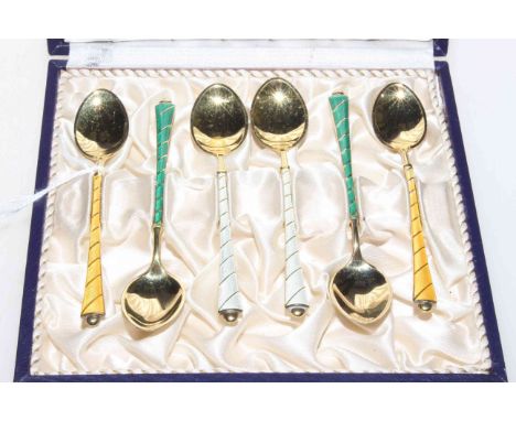 Cased set of six Danish silver gilt and enamel coffee spoons.