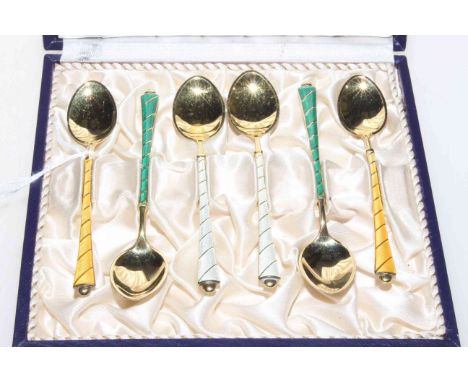 Cased set of six Danish silver gilt and enamel coffee spoons.