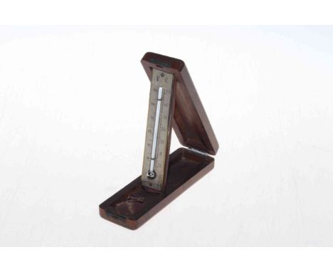 Wooden cased folding travelling thermometer.