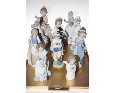 Nine Nao figure and Lladro angel.