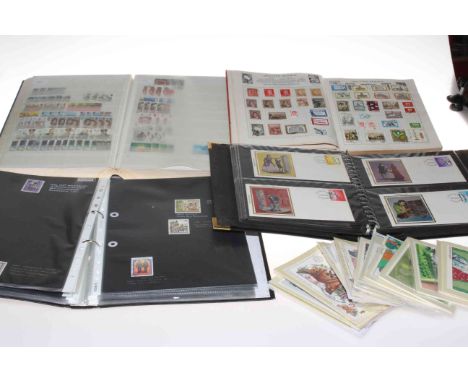 Collection of stamp albums, first day covers, PHQ cards, cigarette card album, etc.