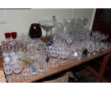 Large assortment of glass and crystal including decanter, vases, jugs, ruby glass.