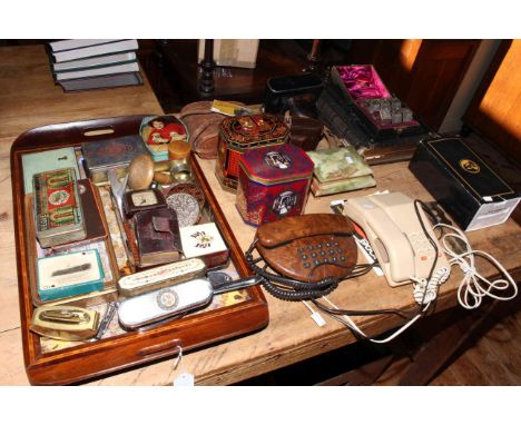 Collection of tins, vintage telephones, binoculars, musical photograph album, cased napkin rings, treen, Ford Popular car clo