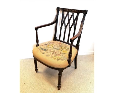 Antique open arm carved mahogany chair with tapestry seat 